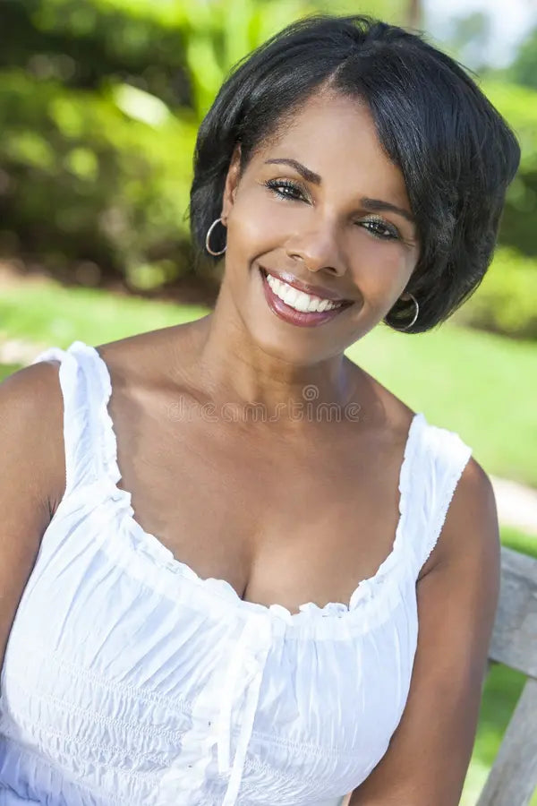 files/beautiful-african-american-woman-relaxing-outside-happy-middle-aged-smiling-46298787.webp